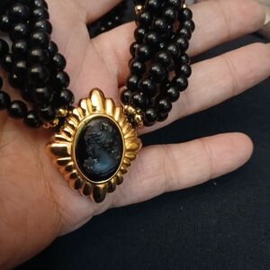 Elegant Black and Gold Cameo Necklace
